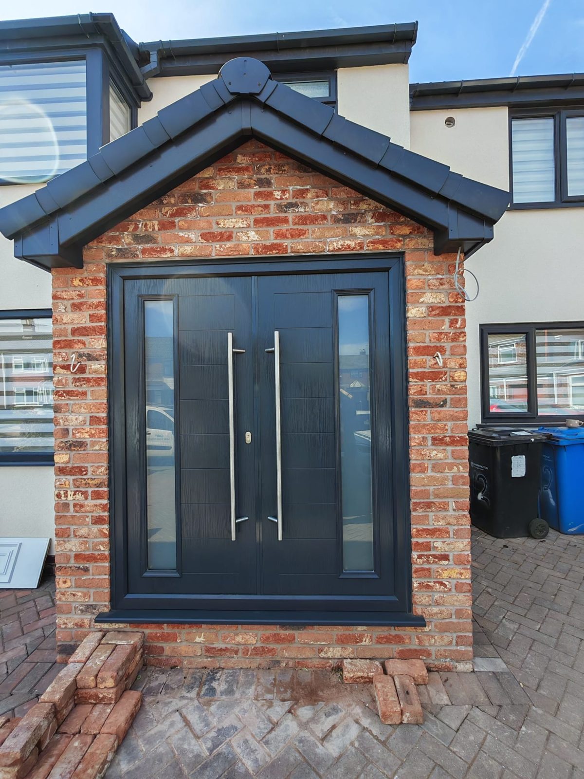 New brick porch with anthracite front door