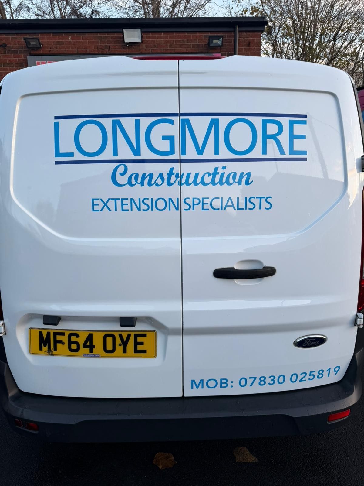 Longmore Construction sign written van